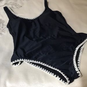 Black one piece swimsuit with cream edging